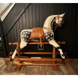 ROCKING HORSE, vintage early 20th century English traditional form, 128cm H x 166cm x 51cm.