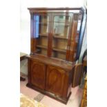 BOOKCASE, 110cm W x 183cm H x 37cm D William IV mahogany with two glazed doors enclosing shelves