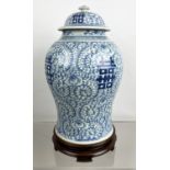 CHINESE BLUE AND WHITE TEMPLE JAR, possibly 19th century on carved hardwood stand, 43cm H.