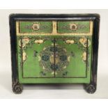 CHINESE SIDE CABINET, early 20th century green lacquered and gilt Chinoiserie decorated with two