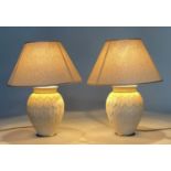 TABLE LAMPS, a pair, leaf incised vase form with shades, 58cm H. (2)