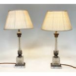 TABLE LAMPS, a pair, with cut glass columns, silvered metal mounts, square plinth and marble base (