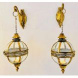 WALL HANGING CANDLE LANTERNS, a pair, Regency style, globular, gilt metal frames, 75cm H. (2)