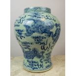 CHINESE BALUSTER VASE, in blue and white underglaze with lion dog decorated, 35cm H.