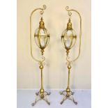 LANTERNS ON STANDS, pair, 163cm H x 35cm W x 30cm D, Regency style,gilt metal. (2)