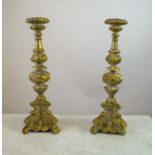 FLORENTINE ALTAR CANDLESTICKS, a pair carved wood with gilt finish, 48cm H. (2)