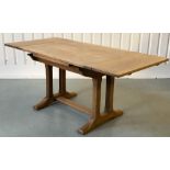 DRAWLEAF EXTENDING DINING TABLE, early 20th century rectangular solid oak and cleated on twin