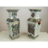 CHINESE FAMILLE ROSE VASES, a pair, late 19th century/early 20th century with enamel decoration