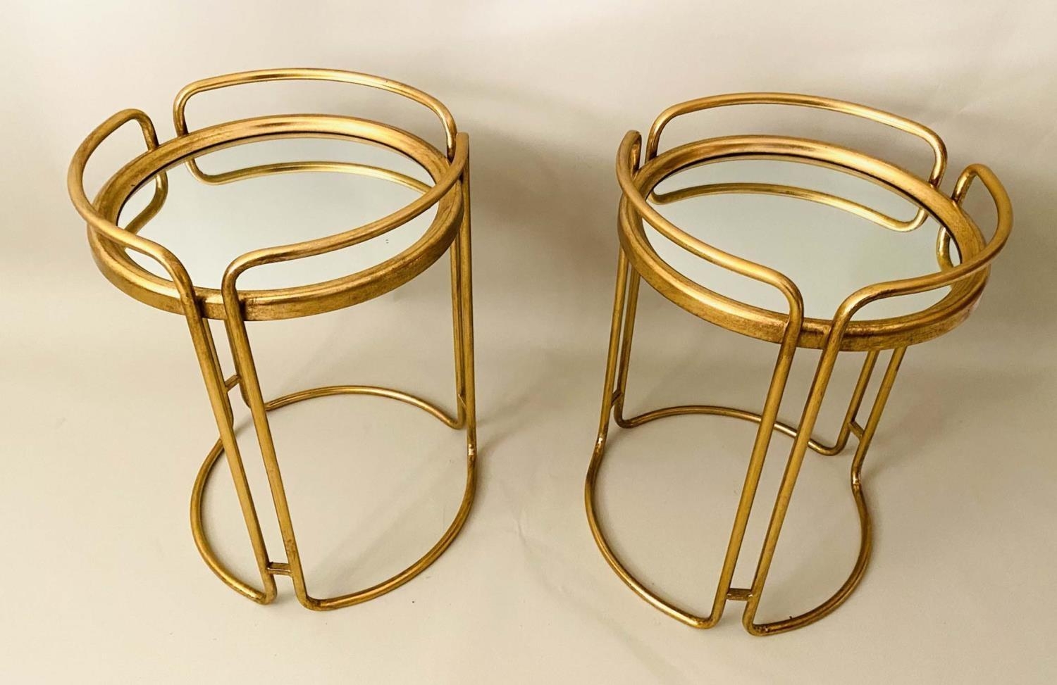 SIDE TABLES, a pair, 63cm H x 48cm D, 1970s Italian Style, gilt metal, mirrored glass inset tops. (