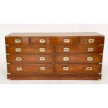 LOW CHEST, Campaign style yewwood and brass bound with nine drawers, 150cm W x 71cm H x 43cm D.