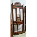 HALL STAND, 84cm W x 213cm H, late Victorian walnut with mirror and tiled panel.