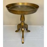 WINE TABLE, 64.5cm x 46.5 cm diam., Regency style, circular top, gallery edge, gilt metal.
