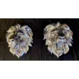 ROARING LION HEADS WALL RELIEF METAL PLAQUES, pair, 49cm x 43cm x 24cm, silvered finish. (2)