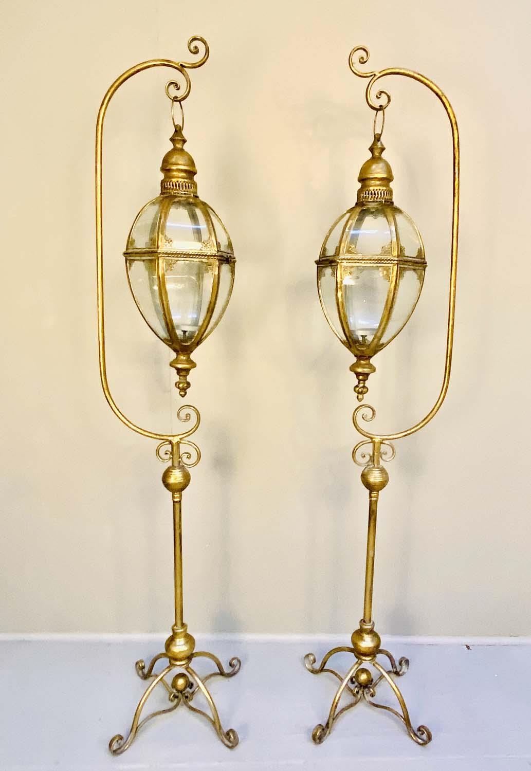 LANTERNS ON STANDS, pair, 163cm H x 35cm W x 30cm D, Regency style,gilt metal. (2)