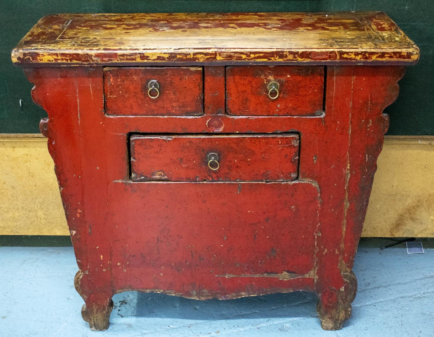 CHEST, 85cm H x 104cm W x 45cm D, 19th century Chinese red lacquered firwood with three drawers.