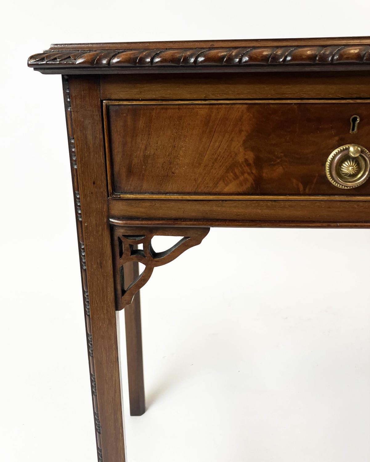 BOWFRONT SIDE TABLE, early 20th century George II style, mahogany with two drawers with leather - Image 2 of 6