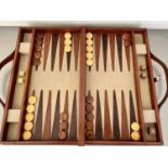 BACKGAMMON SET, in leathered case complete with counters, 40cm x 23cm.