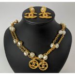 A CHANEL GILT METAL AND FAUX PEARL NECKLACE, 72cm long, together with pair of gilt metal and faux