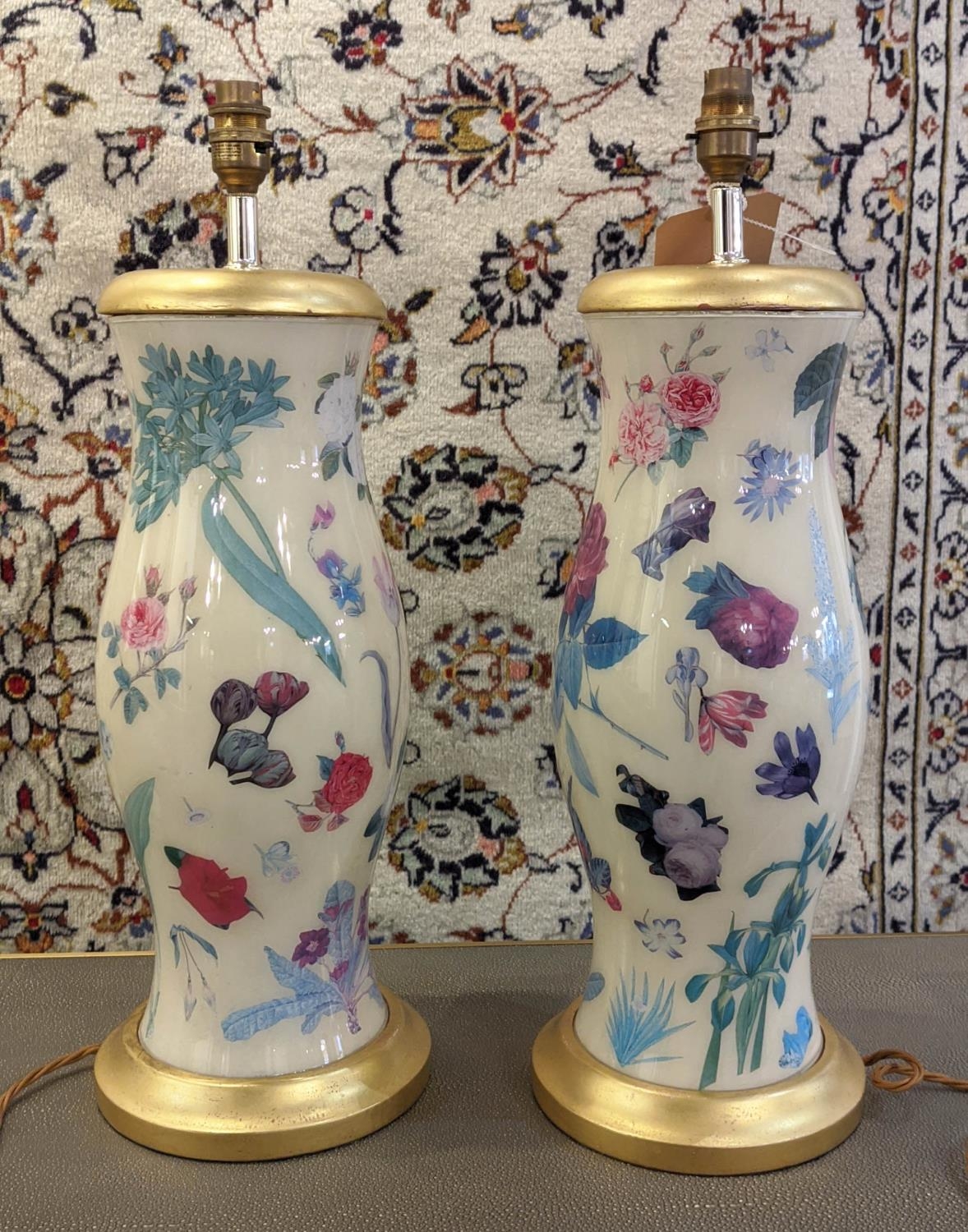 TABLE LAMPS, a pair, each base 46cm H in a floral and gilt design. (2)
