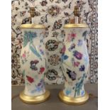 TABLE LAMPS, a pair, each base 46cm H in a floral and gilt design. (2)