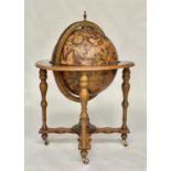 GLOBE COCKTAIL CABINET, in the form of an antique terrestrial globe on stand with rising 'lid' and