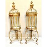 STORMS LANTERNS ON STANDS, pair, 115cm H x 34cm D, in the Regency style, domed glazed topped and