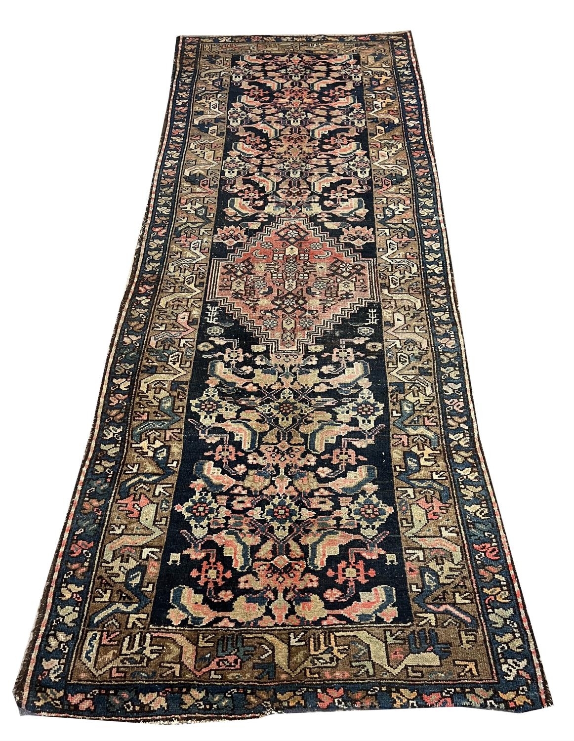 ANTIQUE CAUCASIAN RUNNER, 308cm x 114cm.