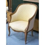 BERGERE, 88cm H x 66cm W, early 20th century French beechwood in pale yellow fabric.