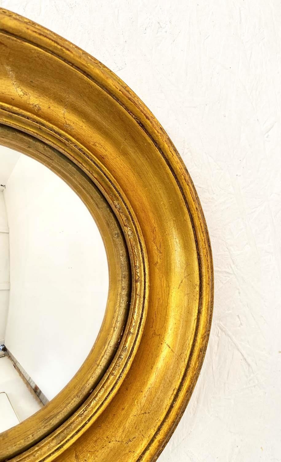 CONVEX WALL MIRRORS, a collection of twelve, Regency style gilt frames, of various sizes and styles, - Image 2 of 2