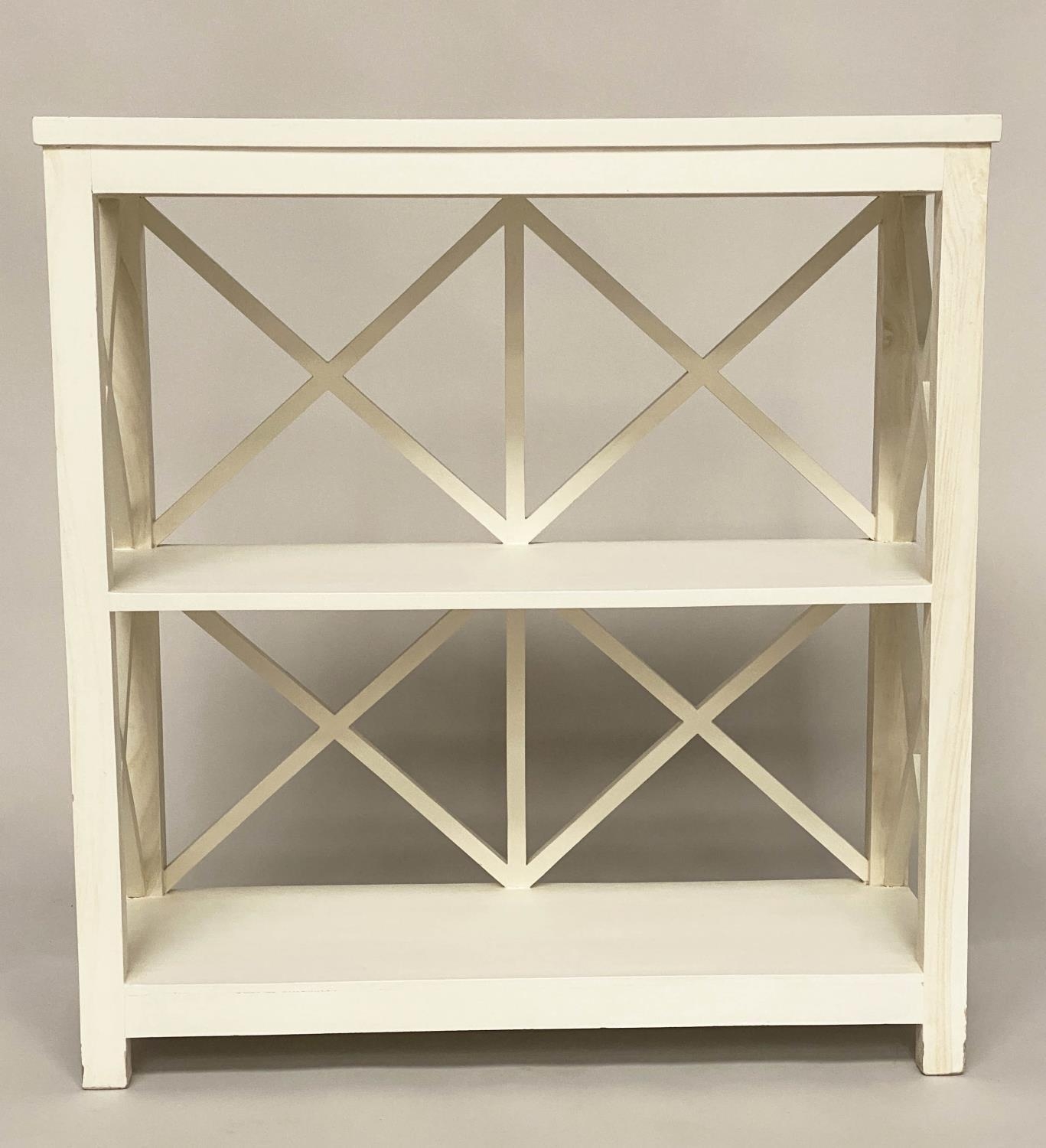 OPEN BOOKCASE, Oka style white painted with two shelves and lattice framework, 85cm W x 33cm D x