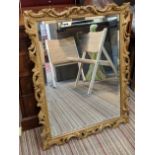 WALL MIRROR, 91cm x 68cm, early 20th century giltwood frame, with a bevelled plate.