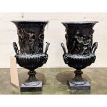 BRONZE CAMPANA URNS, a pair, 'Grand Tour' style with neo classical figures and rams head adorned