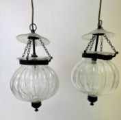 HALL LANTERNS, a set of four, of globular glass form, approx 35cm H, together with a larger glass