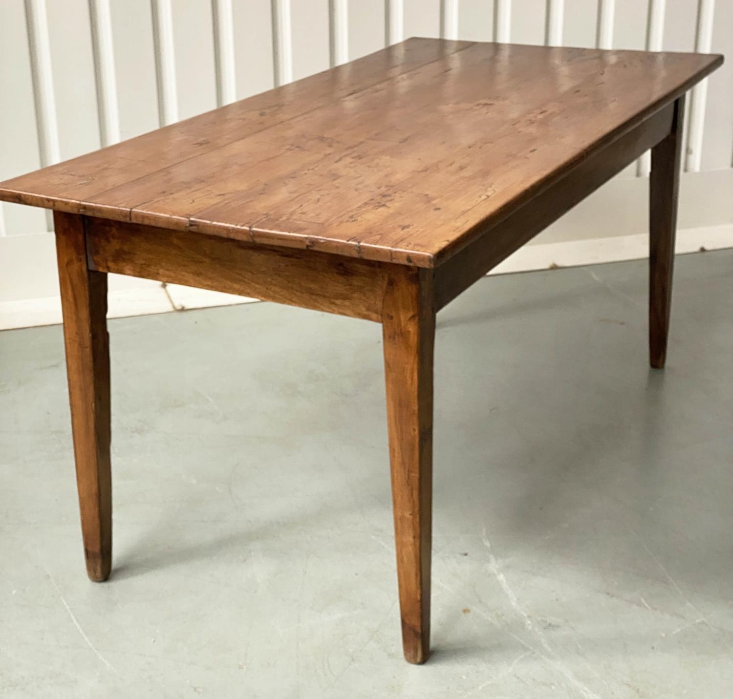 FARMHOUSE TABLE, 19th century French planked cherrywood rectangular with square tapering supports,