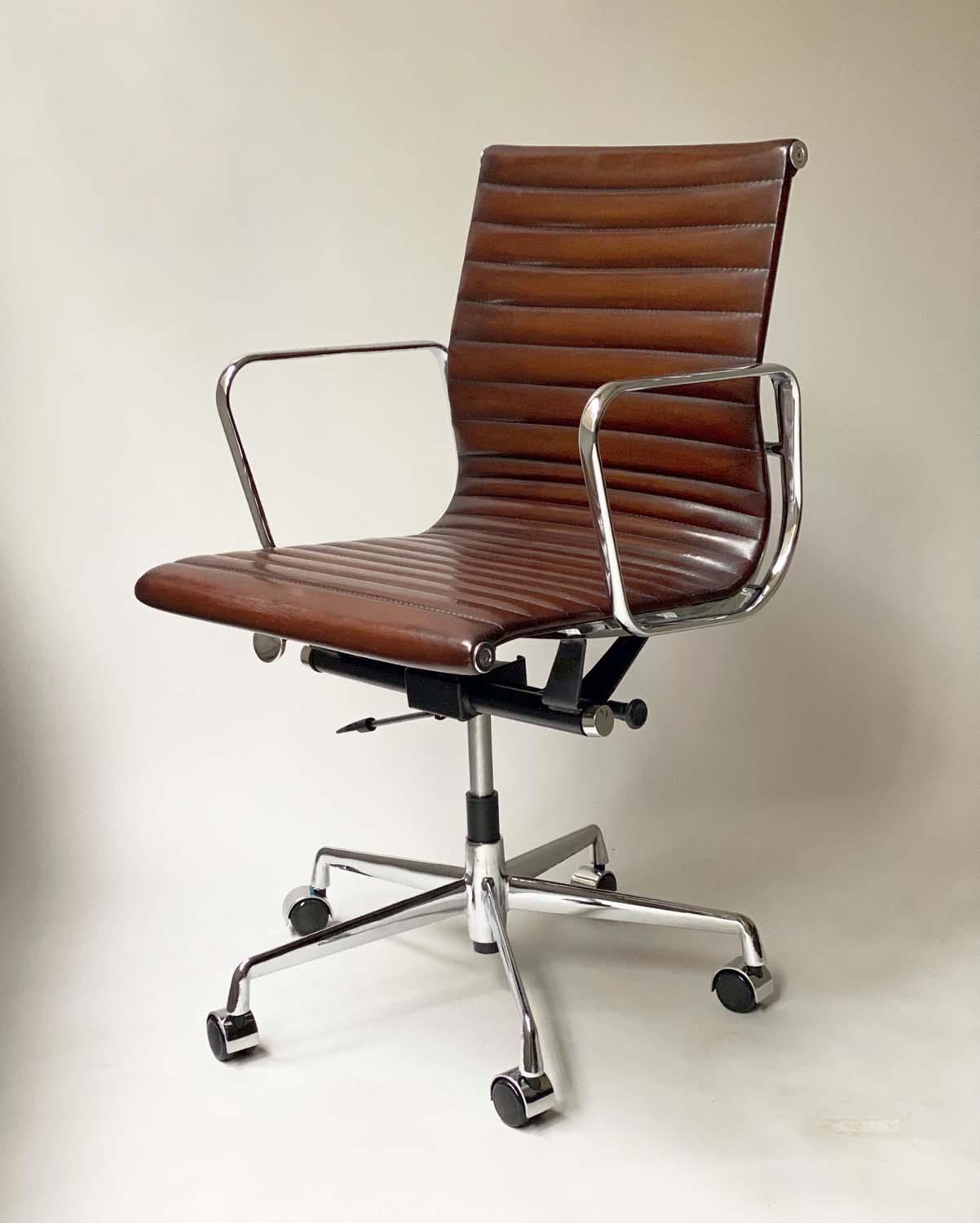 REVOLVING DESK CHAIR, Charles and Ray Eames inspired with ribbed mid brown leather upholstered