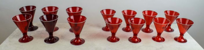 CAPPELLINI MURANO RED COCKTAIL GLASSES, eight small and six large, Italian 1920s with white rim. (