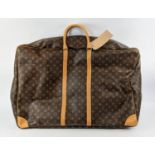 LOUIS VUITTON SIRIUS 70 SUITCASE, monogram canvas with leather trims and double top handles, brass