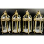 STORM LANTERNS, set of four, 46cm H x 19cm diam., Regency style, gilt metal. (4)