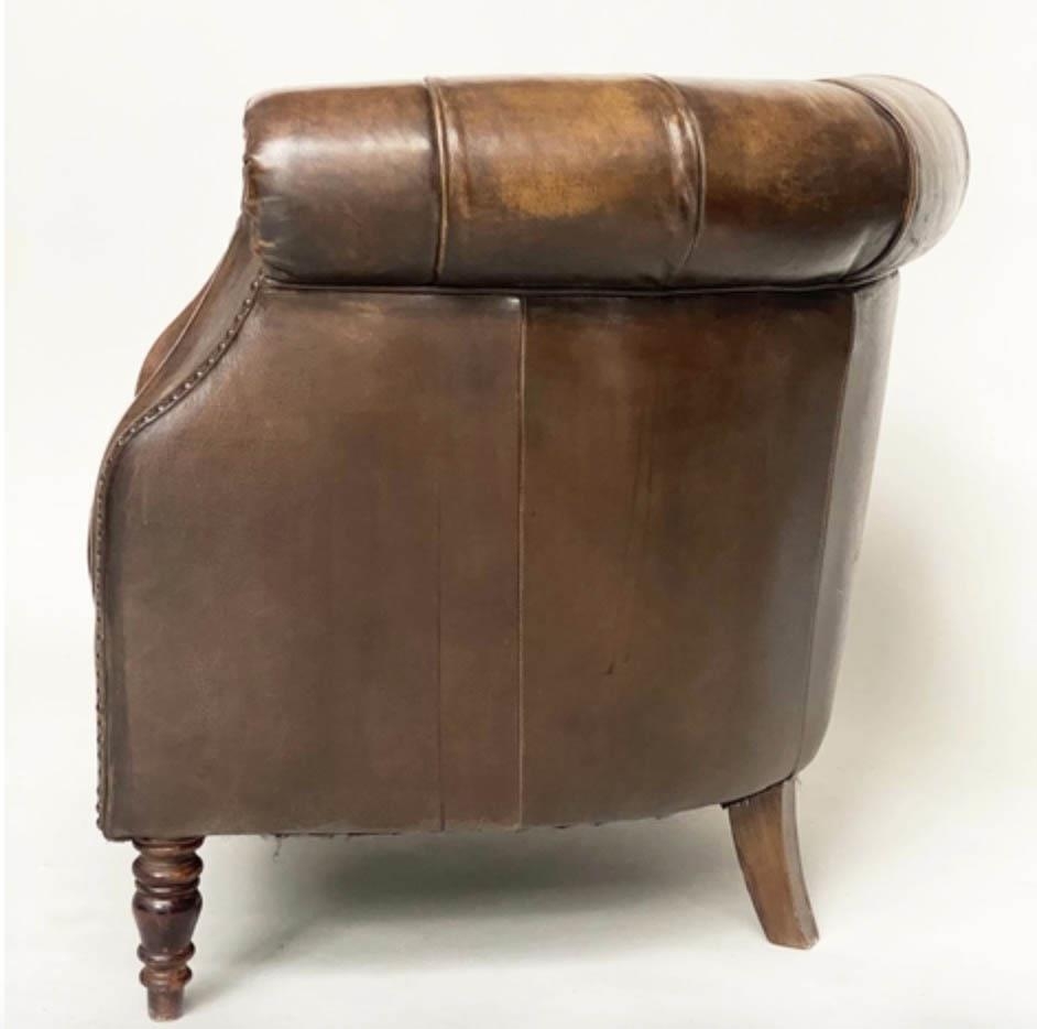 LIBRARY ARMCHAIR, Alexander and James deep buttoned mid brown leather with bow back, 82cm W. - Image 4 of 5