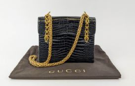 VINTAGE GUCCI CROCODILE HANDBAG, flap closure with double front clasp and horsebit details, with