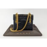 VINTAGE GUCCI CROCODILE HANDBAG, flap closure with double front clasp and horsebit details, with