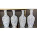PAOLO MOSCHINO VASES, a set of four, with light blue splatter design, 46cm H. (4)