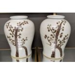 PAOLO MOSCHINO RUSTY BROWN TWIST TREE WITH FLARING RIM JARS, a pair, 43cm H. (2)