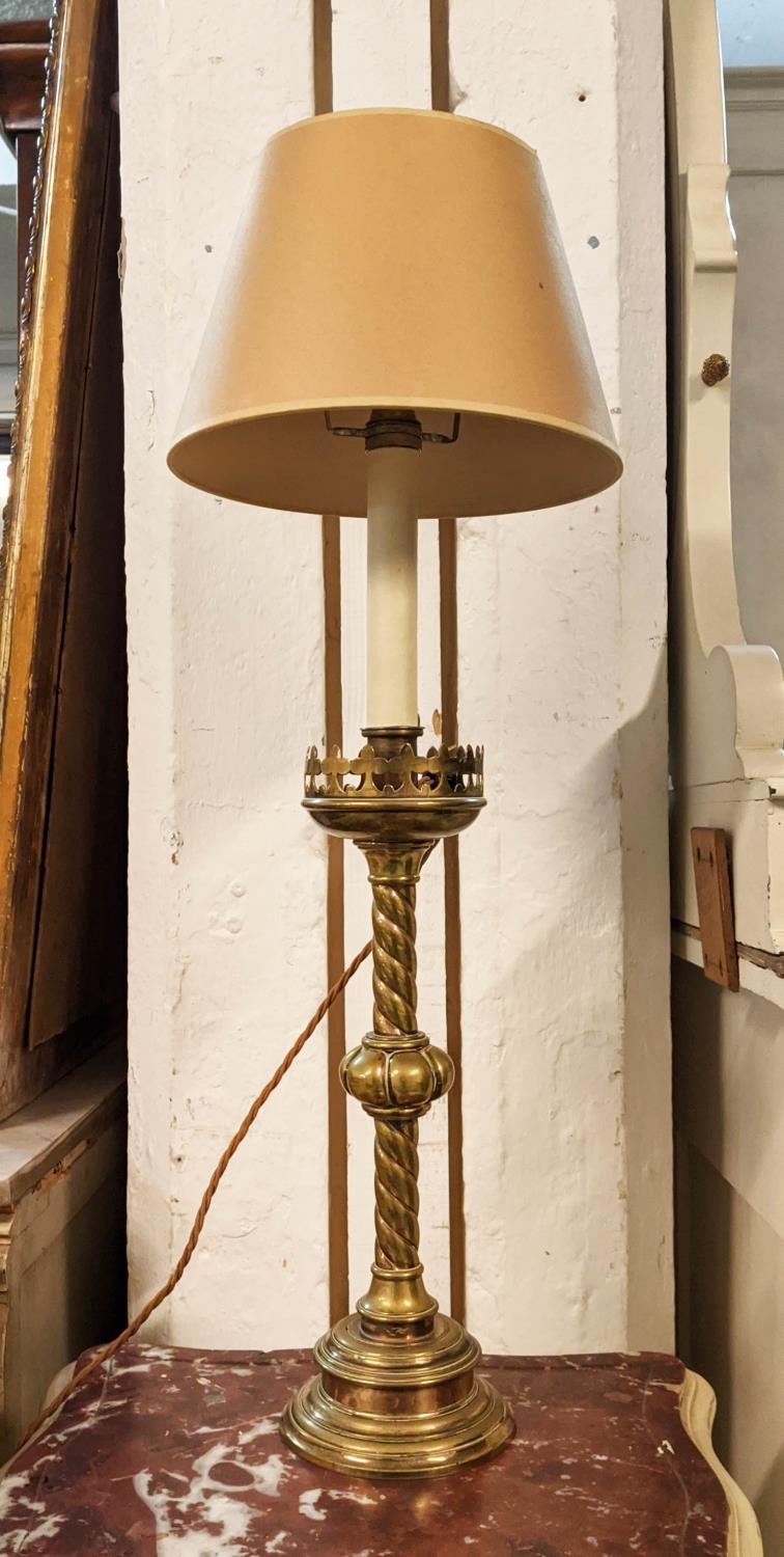 BRASS LAMP, 71cm H including paper shade converted from a Victorian altar candlestick.