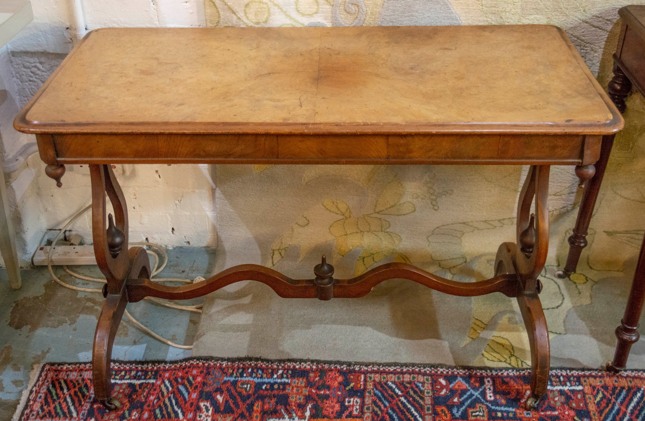 CENTRE TABLE, 105cm W x 69cm H x 51.5cm D Victorian burr walnut on lyre end supports joined by a