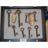 DISPLAY CASE WITH VARIOUS OLD KEYS FROM DALZIEL HOUSE, MOTHERWELL