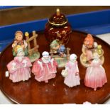 WOODEN LAZY SUSAN, 3 HUMMEL FIGURINES, 4 ROYAL DOULTON FIGURINES & CARLTON WARE LIDDED JAR