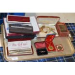 TRAY WITH ASSORTED PENS, COSTUME JEWELLERY, WRIST WATCHES, MONEY BANK ETC