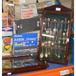 2 DISPLAY CASES WITH VARIOUS SOUVENIR SPOONS