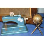 VINTAGE VULCAN JUNIOR SEWING MACHINE & SILVER BOWLING JACK ON STAND
